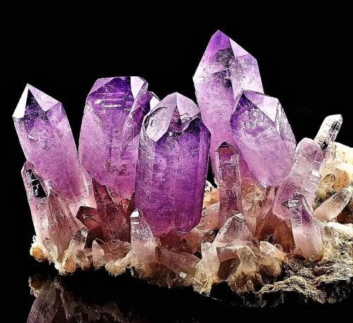 High magnification view showing bubbles in synthetic amethyst